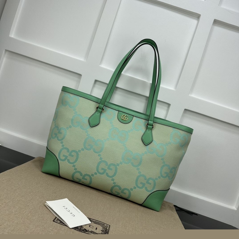G*u*i shopping bags